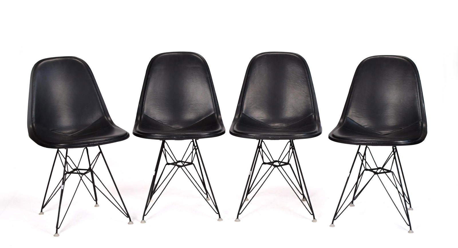 FOUR HERMAN MILLER LEATHER EIFFEL TOWER CHAIRS. (1 of 10)