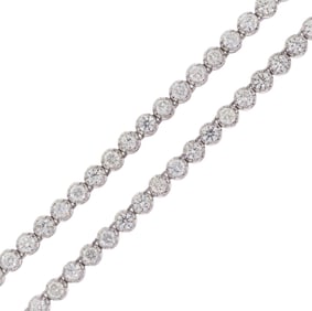 PLATINUM 28 CT. TW. DIAMOND LINE NECKLACE.