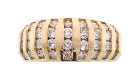 14K GOLD DIAMOND CHANNEL SET BAND.