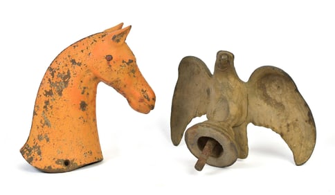ANTIQUE CAST IRON EAGLE AND HORSE HEAD.