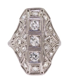 EDWARDIAN PLATINUM DIAMOND SHIELD RING.