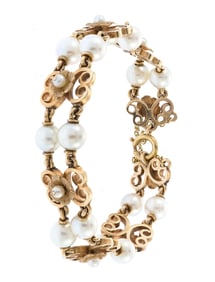 VINTAGE 14K GOLD PEARL BRACELET.
