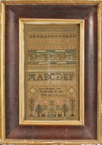 19TH C. NEEDLEWORK SAMPLER SIGNED ANN THOMAS, 1823.