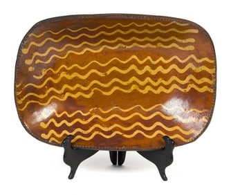 19TH C. AMERICAN REDWARE LOAF DISH, YELLOW SLIP.
