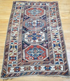 ANTIQUE ORIENTAL SCATTER RUG.