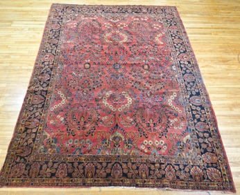 ANTIQUE ROOM SIZE SAROUK RUG.