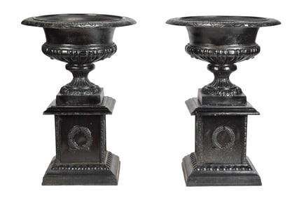 PAIR BLACK PAINTED CAST IRON GARDEN URNS.
