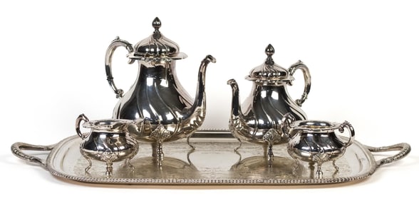 FOUR PIECE SILVER TEA SET WITH PLATED SERVING TRAY.