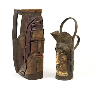 TWO ENGLISH 17TH/18TH C. LEATHER BOMBARDS.