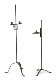 TWO EARLY IRON FLOOR CANDLE LIGHTS.