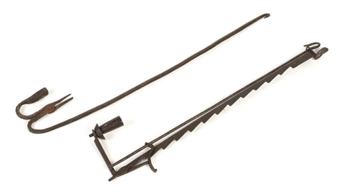 TWO EARLY IRON HANGING RUSH LIGHTS.