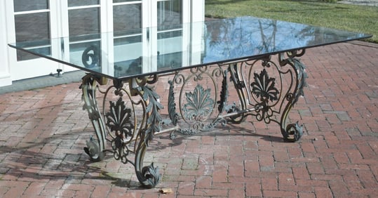 ANTIQUE BRONZE AND IRON PATIO TABLE.