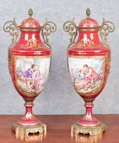 PAIR 20TH C. SEVRES PORCELAIN URNS.