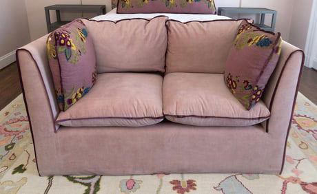 CUSTOM KRAVIT/SCHUMACHER UPHOLSTERED LOVESEAT.