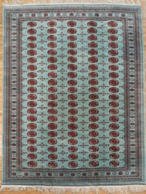 ORIENTAL BOKARA ROOM SIZE RUG.