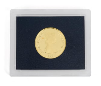 1977 CAYMAN ISLANDS 100 DOLLAR GOLD PROOF COIN.