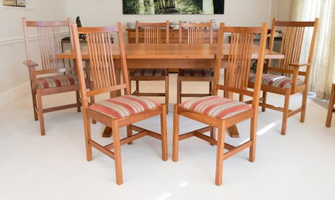 SET OF EIGHT STICKLEY CHAIRS.