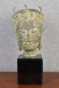 VIETNAMESE BUDDHA HEAD ON STAND.