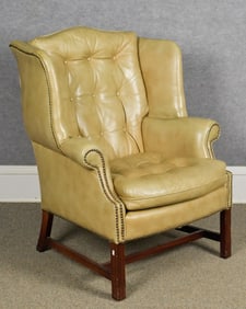 VINTAGE CLASSIC LEATHER WING CHAIR.