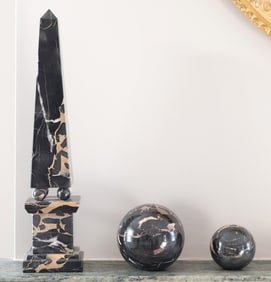 PORTORO MARBLE OBELISK AND PAPERWEIGHTS.