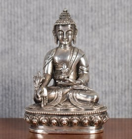 ANTIQUE CHINESE SILVER BUDDHA.