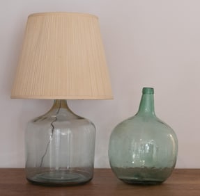 TWO ANTIQUE DEMI JOHN BOTTLES.