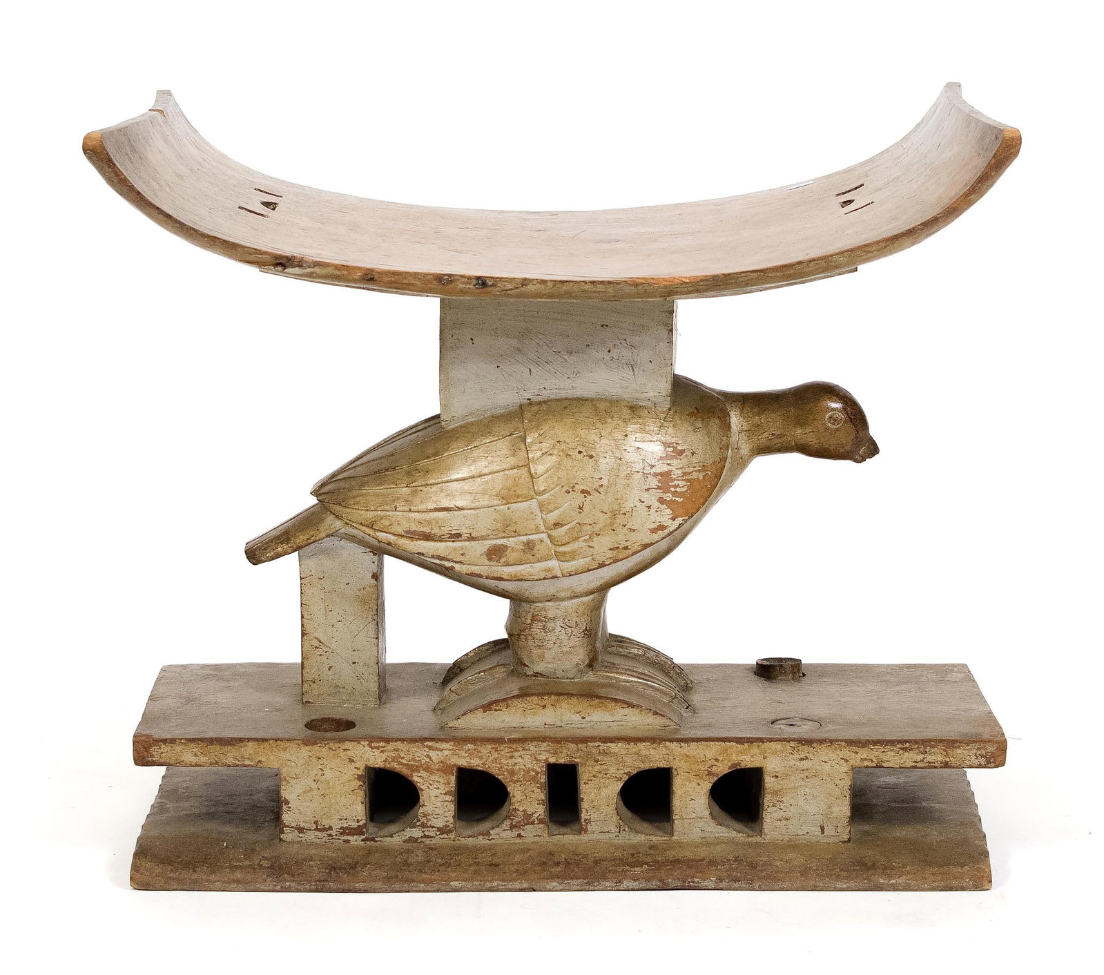 ANTIQUE AFRICAN CARVED BIRD SEAT.: An early 20th C. African carved and white painted seat, with a full bodied bird support. 21”H x 23.5”W x 14”D.