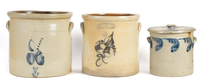 THREE ANTIQUE STONEWARE CROCKS.