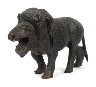 ANTIQUE CARVED WALNUT LION.