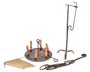 TWO EARLY WROUGHT IRON LIGHTING DEVICES.