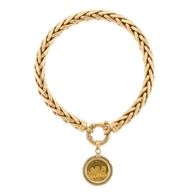18K MILOR GOLD ROPE BRACELET WITH COIN.