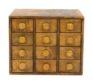 ANTIQUE TWELVE DRAWER OAK APOTHECARY CHEST.