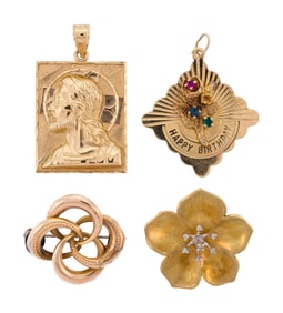 FOUR VINTAGE 14K GOLD PENDANTS.