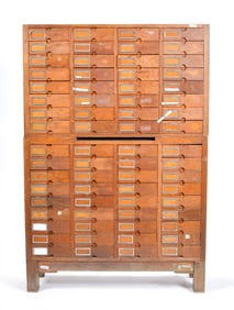 EARLY 20TH C. 68 DRAWER OAK CABINET.