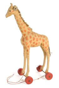 ANTIQUE STEIFF FELT GIRAFFE ON WHEELS.