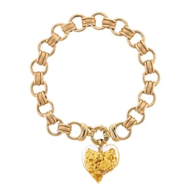 14K GOLD LINK BRACELET W/ 22K GOLD FLAKE HEART CHARM.