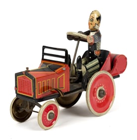 LOUIS MARX LITHOGRAPHED TIN COO COO CAR WIND-UP TOY.