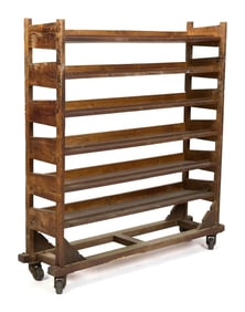 EARLY 20TH C. INDUSTRIAL OAK ROLLING RACK.