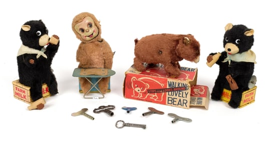 FOUR VINTAGE TOYS.