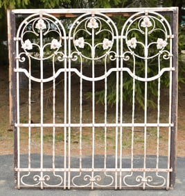 ANTIQUE CAST IRON WINDOW GRATE.