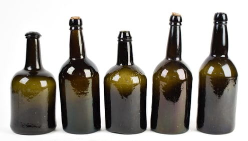 FIVE ANTIQUE WHISKEY BOTTLES.