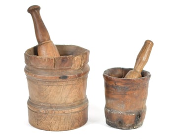 TWO EARLY WOOD MORTAR AND PESTLES.