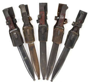 FIVE VINTAGE MILITARY GRADE BAYONETS.