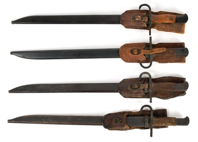 FOUR VINTAGE MILITARY BAYONETS.