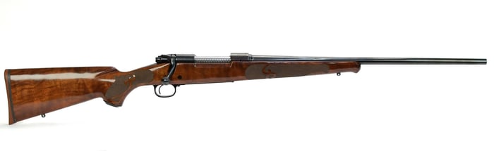 WINCHESTER MODEL 70XTR 7MM BOLT ACTION RIFLE.