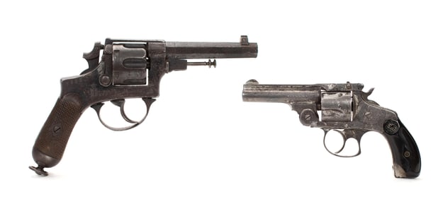 TWO DAMAGED REVOLVERS.