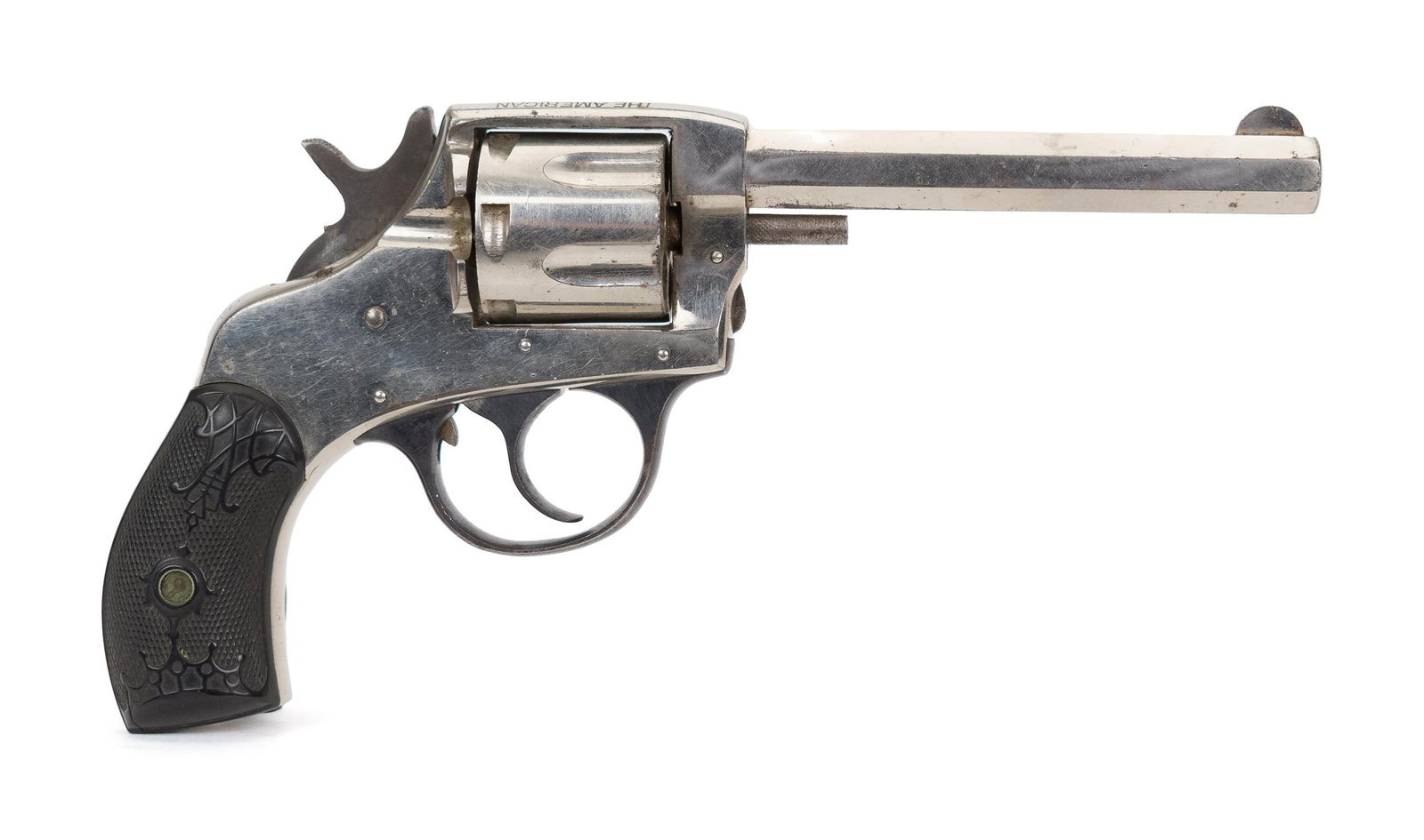 HARRINGTON & RICHARDSON AMERICAN .32 CAL REVOLVER.: Harrington & Richardson American double action .32SW caliber revolver, 4.5” barrel, Overall 9”L. Ca. 1900. Nickeled finish. Serial #214593, T-655. NICS Background check required unless FFL