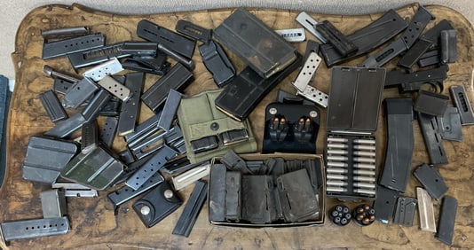 LARGE COLLECTION OF MAGAZINES, SOME LOADED.