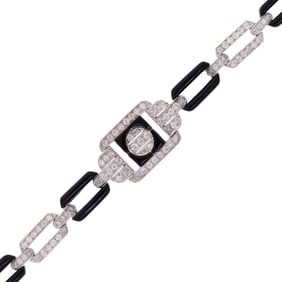 ART DECO 18K GOLD DIAMOND & BLACK ONYX BRACELET.