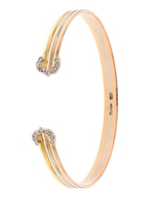 CARTIER 18K TRI-GOLD DIAMOND CUFF BRACELET.
